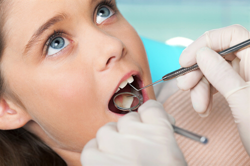 Picture of dental treatment with child